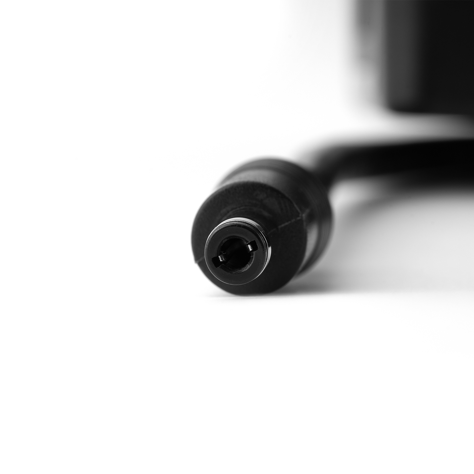 Macro shot of round DC barrel connector tip