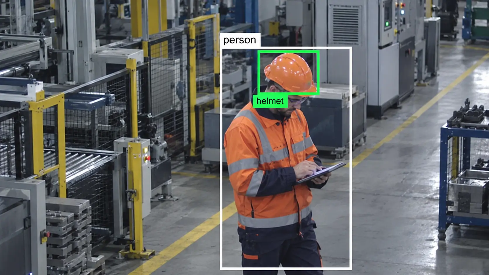 AI safety detection for factory workers Factory worker monitored by an AI safety detection system