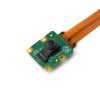 Angled perspective of the Raspberry Pi IMX219 camera module with ribbon cable, showing lens and board design.